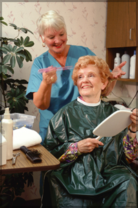 A woman getting her hair done at a hair salon.
